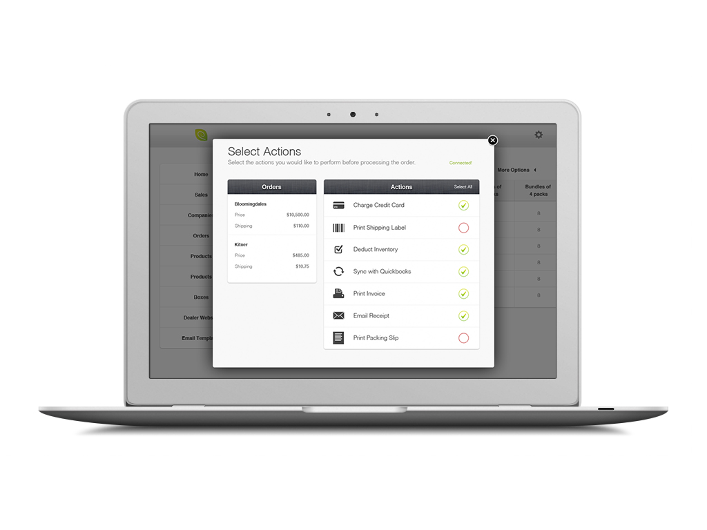 Laptop showing the Lettuce order screen, with actions for payment, shipping, inventory, and receipts.